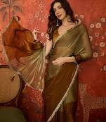Brown & gold tissue satin sequins saree with unstitched blouse piece.