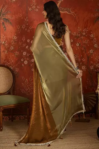 Brown & gold tissue satin sequins saree with unstitched blouse piece.
