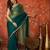 Rama & gold tissue satin sequins saree with unstitched blouse piece.