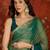Rama & gold tissue satin sequins saree with unstitched blouse piece.