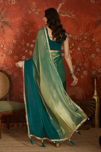 Rama & gold tissue satin sequins saree with unstitched blouse piece.