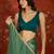 Rama & gold tissue satin sequins saree with unstitched blouse piece.