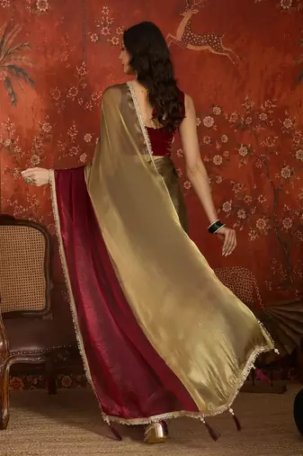 Wine & gold tissue satin sequins saree with unstitched blouse piece.