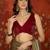 Wine & gold tissue satin sequins saree with unstitched blouse piece.