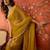 Yellow & gold tissue satin sequins saree with unstitched blouse piece.