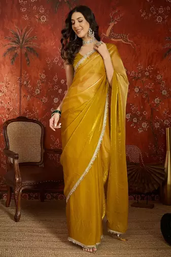 Yellow & gold tissue satin sequins saree with unstitched blouse piece.