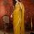 Yellow & gold tissue satin sequins saree with unstitched blouse piece.