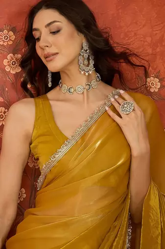 Yellow & gold tissue satin sequins saree with unstitched blouse piece.