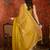 Yellow & gold tissue satin sequins saree with unstitched blouse piece.