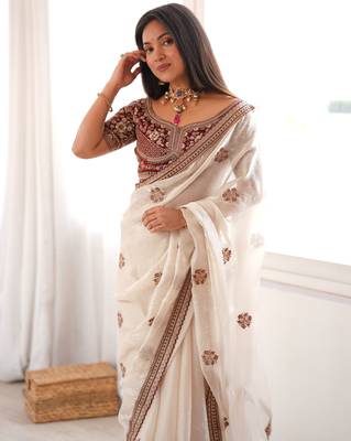 Cream tissue satin embroidered saree with unstitched blouse piece. 3