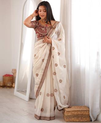 Cream tissue satin embroidered saree with unstitched blouse piece. 5