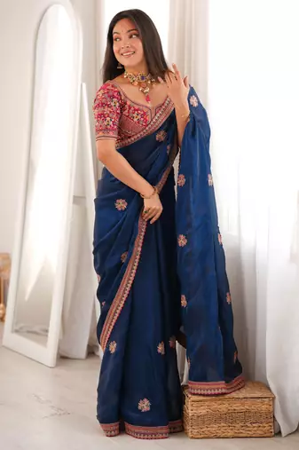 Navy blue tissue satin embroidered saree with unstitched blouse piece.