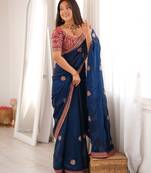 Navy blue tissue satin embroidered saree with unstitched blouse piece.