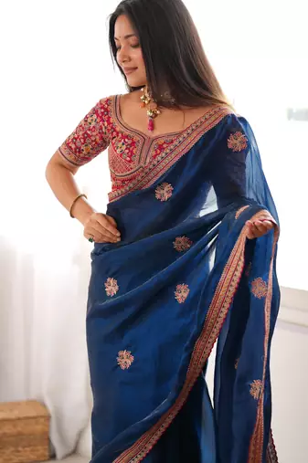 Navy blue tissue satin embroidered saree with unstitched blouse piece.