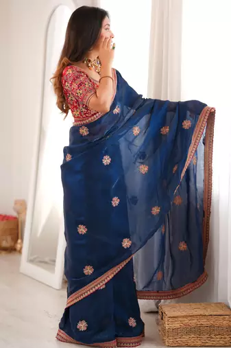 Navy blue tissue satin embroidered saree with unstitched blouse piece.
