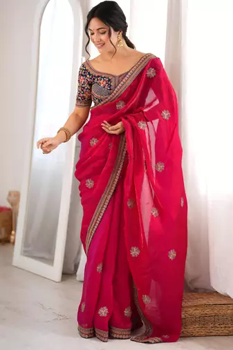 Rani tissue satin embroidered saree with unstitched blouse piece.