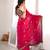 Rani tissue satin embroidered saree with unstitched blouse piece.