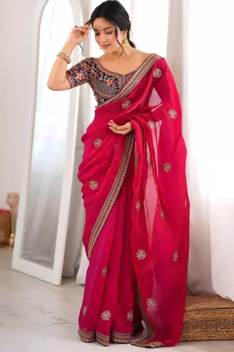 Rani tissue satin embroidered saree with unstitched blouse piece.