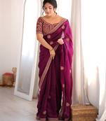 Wine tissue satin embroidered saree with unstitched blouse piece.