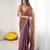 Brown tissue satin embroidered saree with unstitched blouse piece.