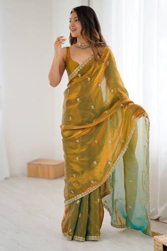 Gold tissue satin embroidered saree with unstitched blouse piece.