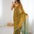 Gold tissue satin embroidered saree with unstitched blouse piece.