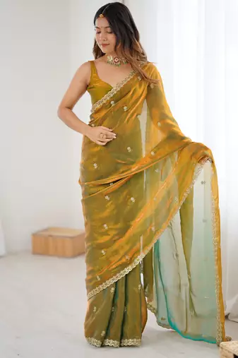 Gold tissue satin embroidered saree with unstitched blouse piece.