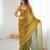 Gold tissue satin embroidered saree with unstitched blouse piece.