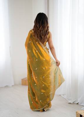 Gold tissue satin embroidered saree with unstitched blouse piece. 4