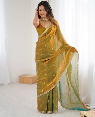 Gold tissue satin embroidered saree with unstitched blouse piece. 5