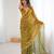 Gold tissue satin embroidered saree with unstitched blouse piece.