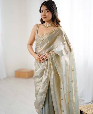 Grey tissue satin embroidered saree with unstitched blouse piece. 5