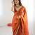 Orange tissue satin embroidered saree with unstitched blouse piece.