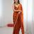 Orange tissue satin embroidered saree with unstitched blouse piece.