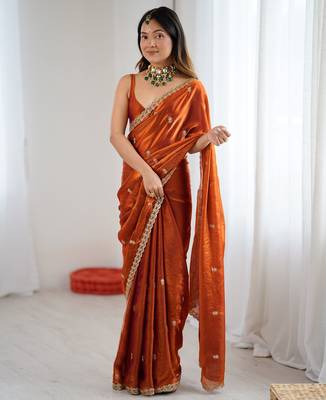 Orange tissue satin embroidered saree with unstitched blouse piece. 3