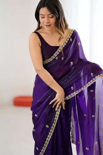 Purple tissue satin embroidered saree with unstitched blouse piece.