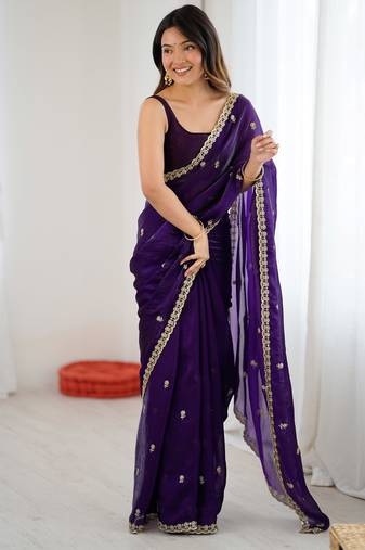 Purple tissue satin embroidered saree with unstitched blouse piece.