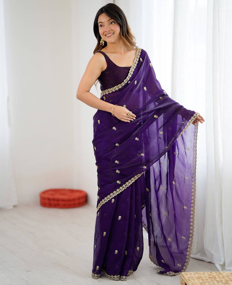 Purple tissue satin embroidered saree with unstitched blouse piece.