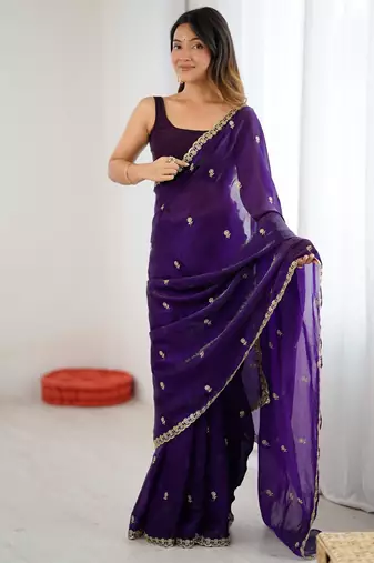 Purple tissue satin embroidered saree with unstitched blouse piece.