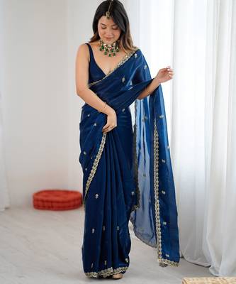Teal tissue satin embroidered saree with unstitched blouse piece. 4
