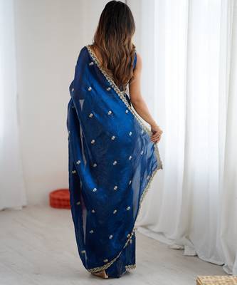 Teal tissue satin embroidered saree with unstitched blouse piece. 5
