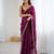 Wine tissue satin embroidered saree with unstitched blouse piece.