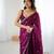 Wine tissue satin embroidered saree with unstitched blouse piece.