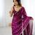 Wine tissue satin embroidered saree with unstitched blouse piece.