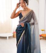 Grey & navy blue tissue satin sequins saree with unstitched blouse piece.