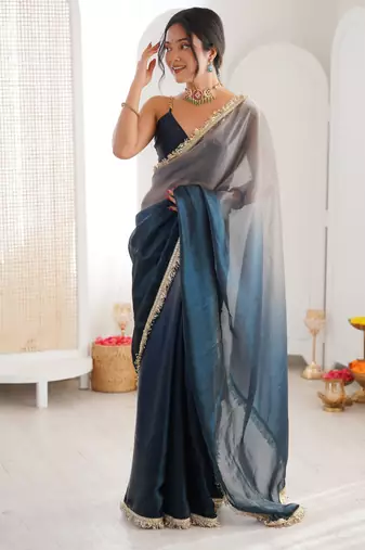 Grey & navy blue tissue satin sequins saree with unstitched blouse piece.