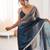 Grey & navy blue tissue satin sequins saree with unstitched blouse piece.