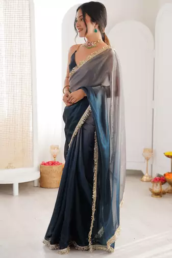 Grey & navy blue tissue satin sequins saree with unstitched blouse piece.