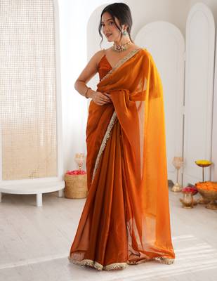 Mustard tissue satin sequins saree with unstitched blouse piece. 2