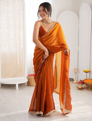 Mustard tissue satin sequins saree with unstitched blouse piece. 3
